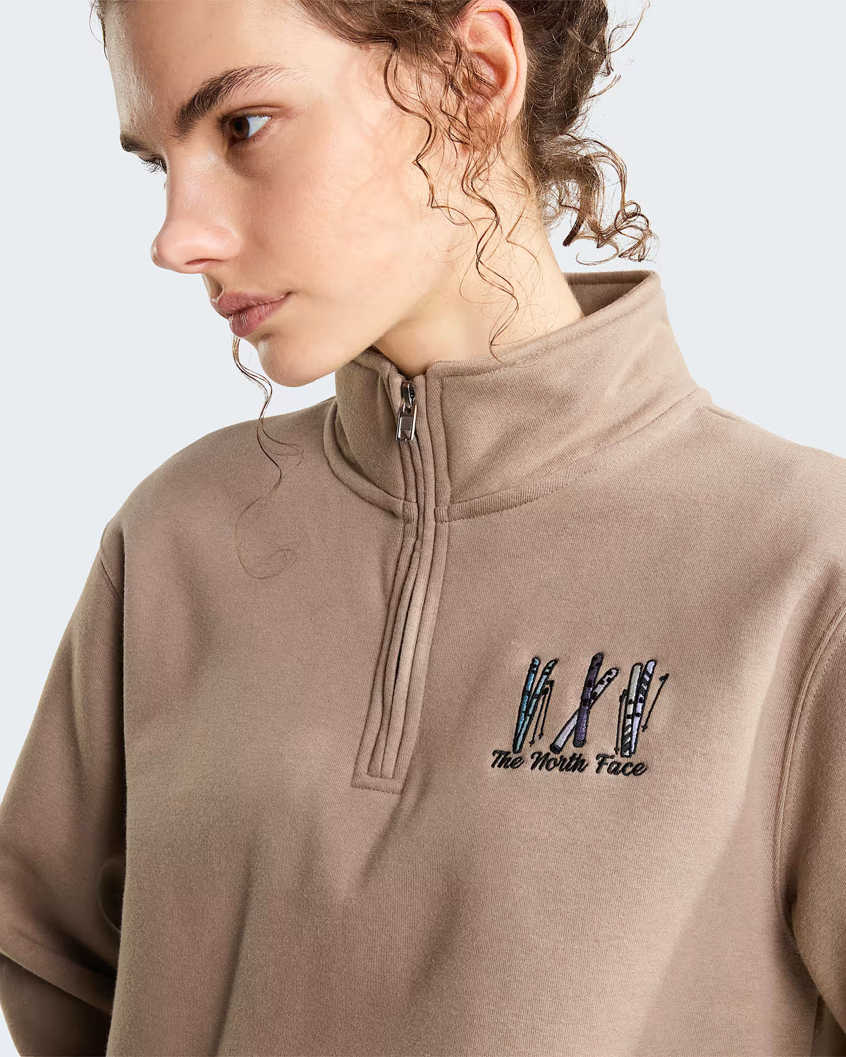 The North Face Womens Ski Embroidery Relaxed Graphic 1/4 Zip Sweatshirt